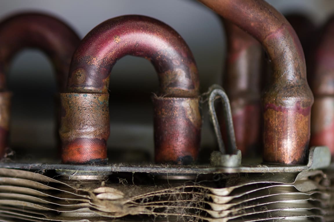 Close-up of copper return bends on a condenser coil